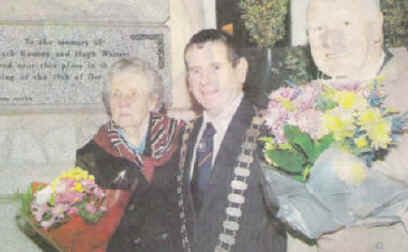 Councillor Martin Bellew, Chairman Dundalk Town Council, with Maisie Rooney, the wife of the late Jack Rooney and Tommy Watters, brother of the late Hugh Watters, at the plaque outside the Town Hall, Dundalk,  where both men were killed in the 1975 Crowe Street bombing. Photograph from The Dundalk Democrat.