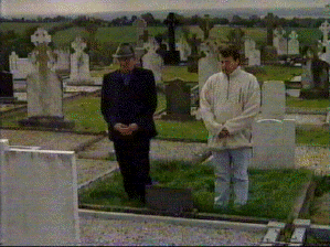 Photograph: Kevin Ludlow and his nephew Jimmy Sharkey pictured at Seamus Ludlow's grave at Ravensdale.